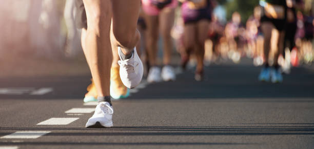 istock Marathon running in the light of morning 2148401256
