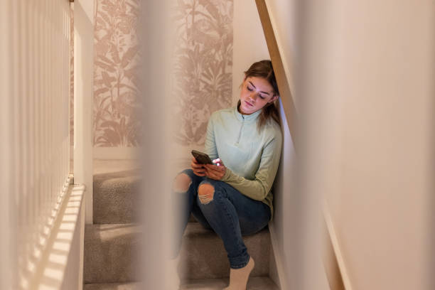 istock Teen Unwinding on the Stairs 2148402099