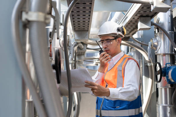 istock Engineers are inspecting a large building or industrial facility's cooling system for the air conditioning. 2148404355