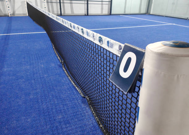 istock Padel Net on Empty Court With Scoreboard Hanging 2148408771