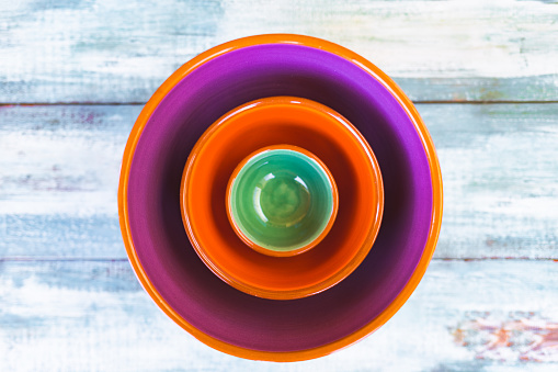 Vibrant Majorcan ceramic bowls with richly colored interiors. Part of a series.