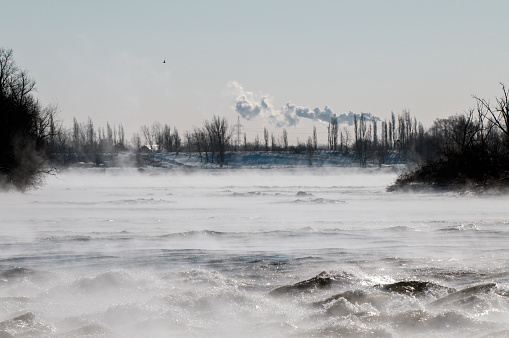 Located near Montreal, in the borough of LaSalle. Quebec,  the fast moving waters on an extremely cold winter day.