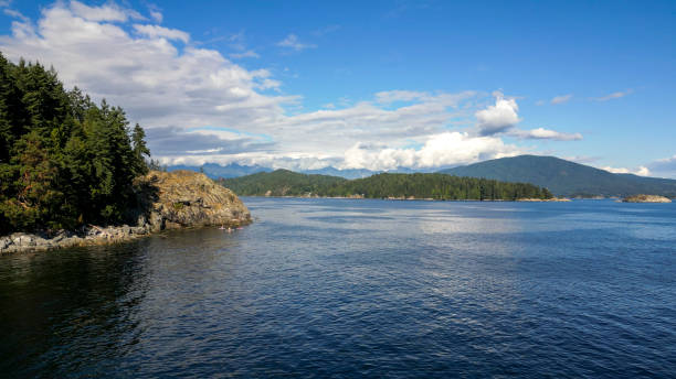 istock Aerial view of forested coastline and mountains 2148414855