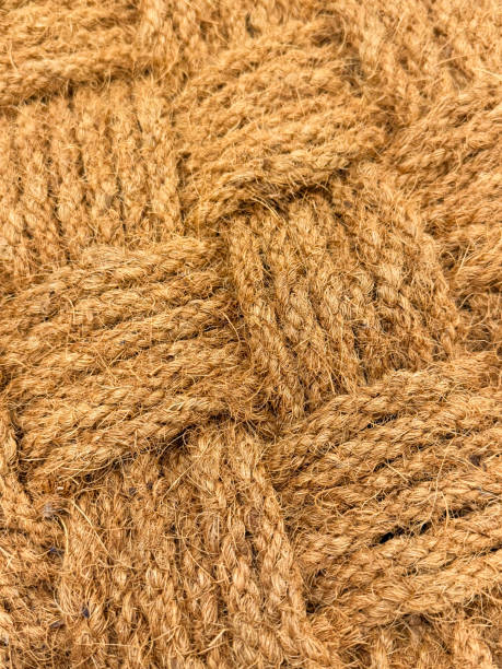 istock Full frame image of woven coir (coconut fibre) rope door mat, elevated view 2148415124