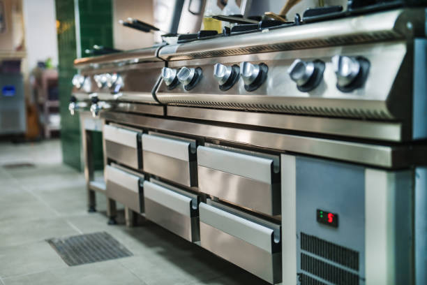 Part of a series of Two chefs working in a restaurant's kitchen.