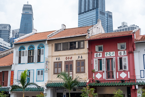 Singapore - 8 March 2024: Colorful building on South Bridge Road in Chinatown includes food street, souvenir shops and traditional shophouses. It is a must-visit place for tourists.