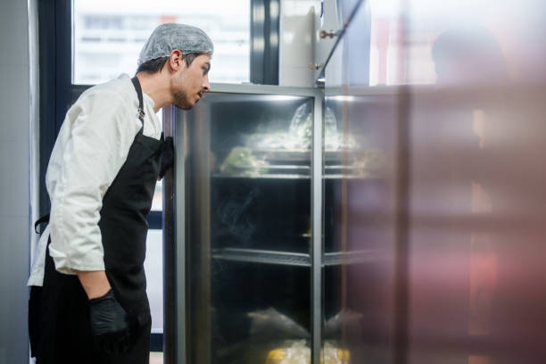 istock The restaurant chef is checking the refrigerator in the kitchen for ingredients. 2148415910