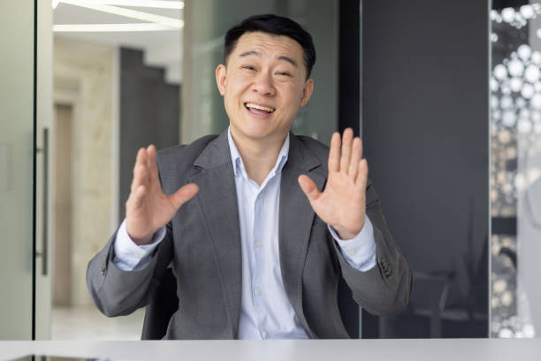 istock Asian businessman in office during a video call 2148417913
