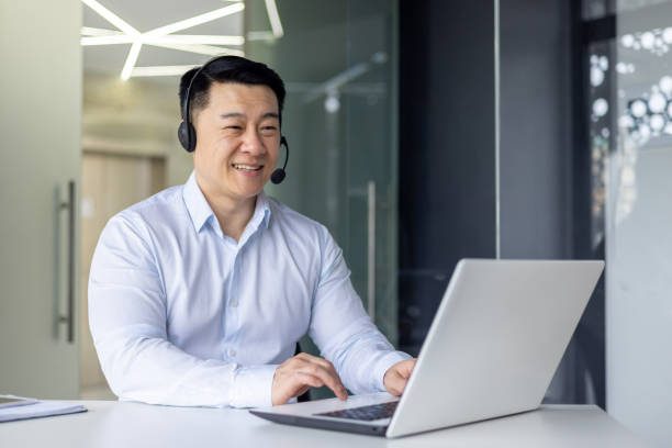 istock Asian businessman working happily in modern office 2148422718