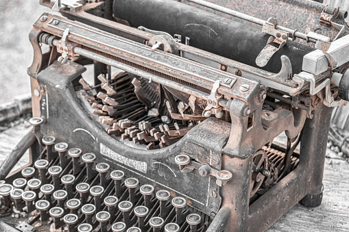 An antique typewriter rusting away in the desert, at Goldfield Ghost Town in Apache Junction, Arizona.