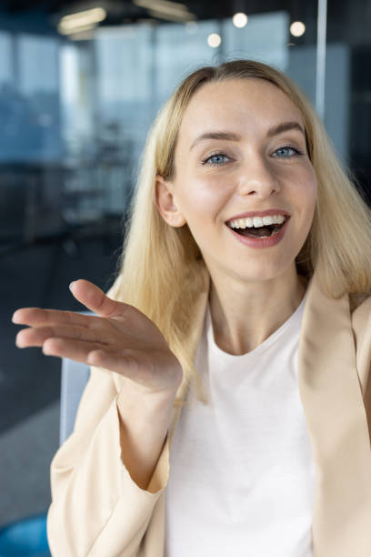 istock Smiling businesswoman engaged in a friendly conversation 2148424410