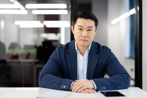 istock Professional businessman in modern office setting 2148425298