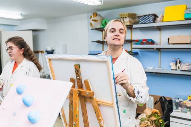 istock Inspiring Artistic Creation in a Special Needs Painting Class 2148429433
