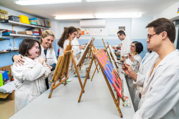 istock Excitement and Joy in Art Class with Down Syndrome Artists at Work 2148429726