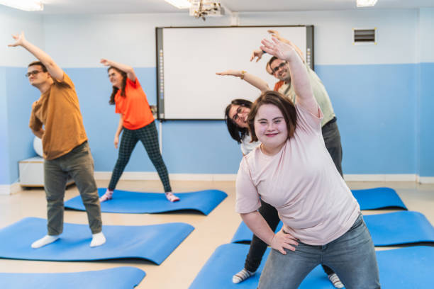 istock Inclusive Yoga Class Embraces Joyful Movement Together 2148430266