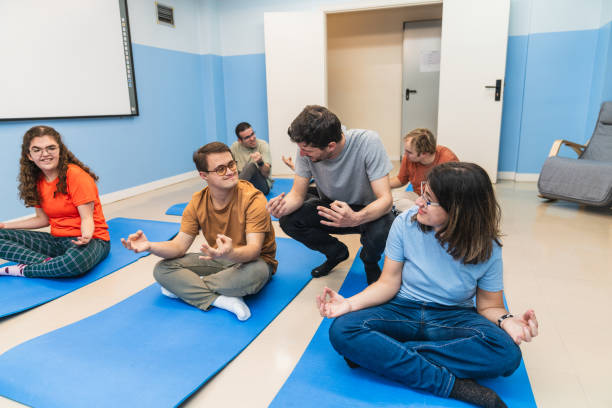 istock Yoga Instruction for People with Down Syndrome 2148430400