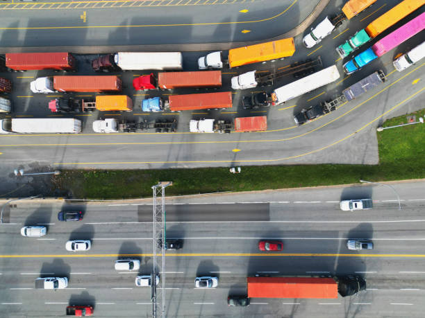Traffic at Container Pier Aerial view of heavy traffic at a container pier. parallel port stock pictures, royalty-free photos & images
