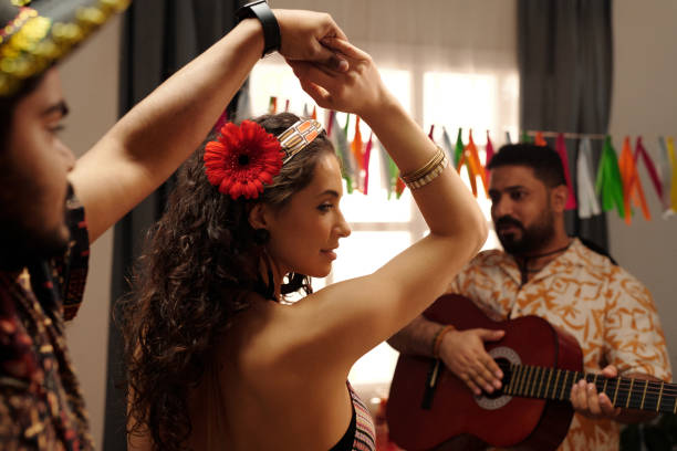 In Seville, flamenco dancers in colorful dresses move gracefully toward the Feria, captured with a blurred, dynamic effect.