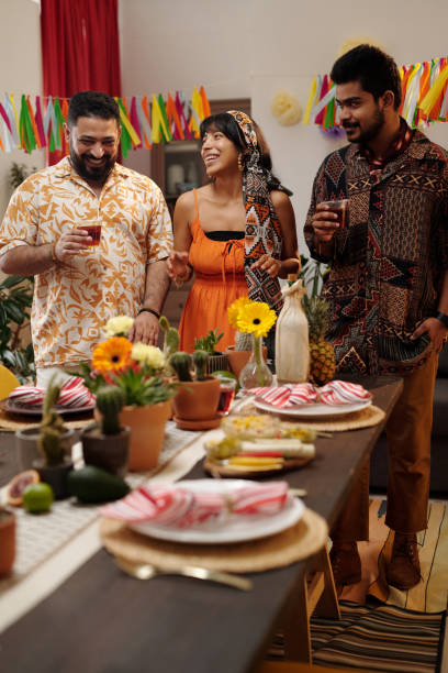 istock Three cheerful friends making toast 2148435226