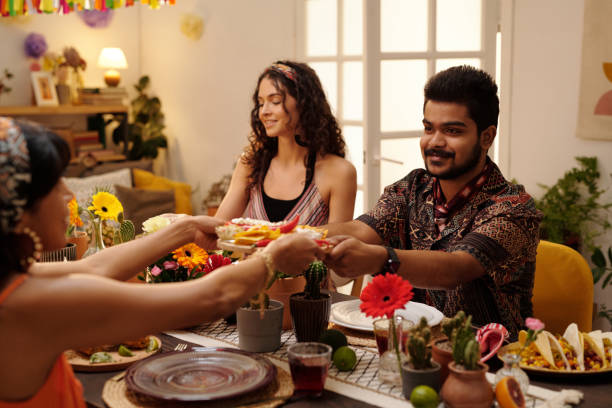 istock Man taking snacks from hands of girl 2148435276
