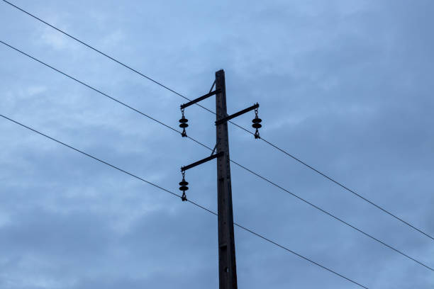 istock Critical infrastructure for electricity transmission - medium voltage line - pole and cables 2148435644