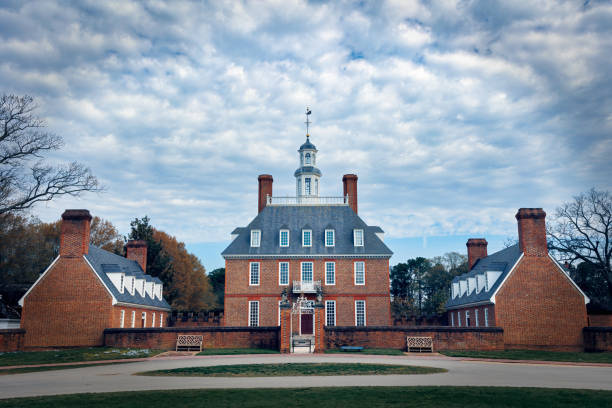 Clouds over the Palace Clouds over the Governor's Palace in Colonial Williamsburg, Virginia. governor's palace williamsburg stock pictures, royalty-free photos & images