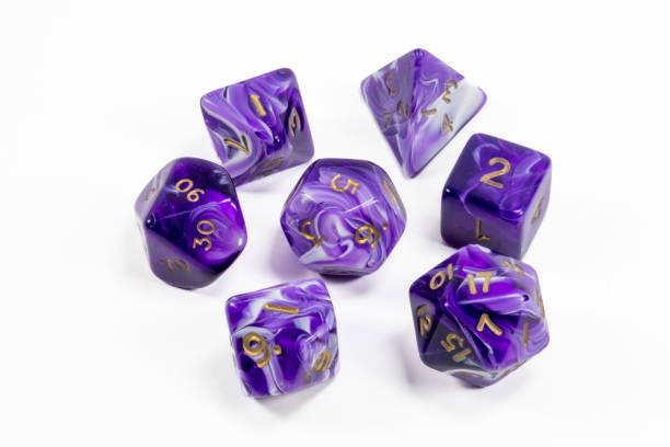 istock A purple set of role playing dice on a white background 2148441442