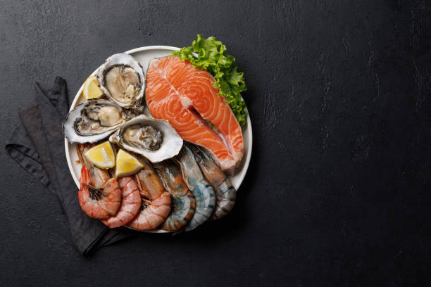 istock Seafood Platter Delight: Shrimps, Salmon, Oysters Galore 2148441729