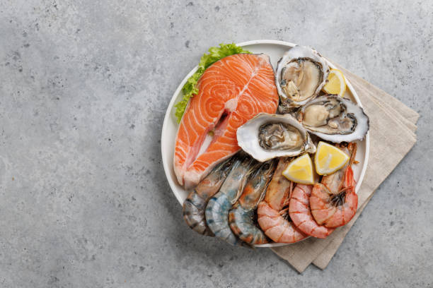 istock Seafood Platter Delight: Shrimps, Salmon, Oysters Galore 2148441788