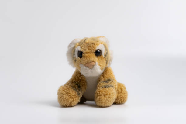 istock tiger stuffed toy isolated on white background 2148441892