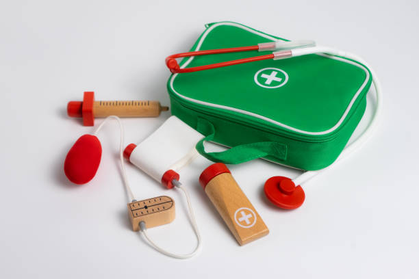 istock kids first aid kit, green bag with medical tools 2148441896