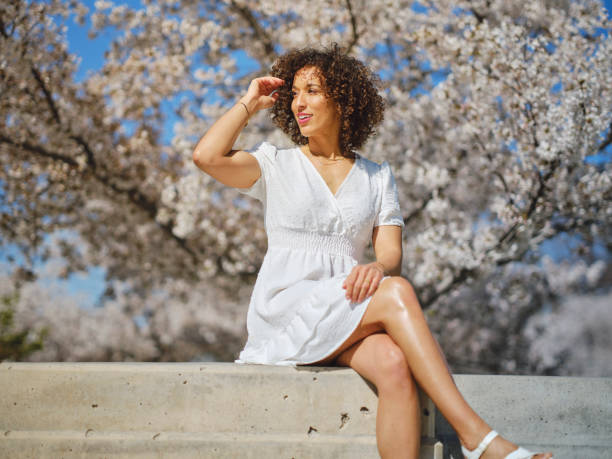istock Woman in Springtime Among Cherry Blossoms 2148442899