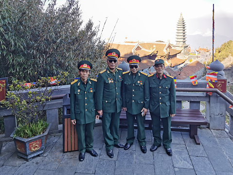 Vietnamese Army officers, participants of the Vietnam War visiting Fansipan, the highest peak in Vietnam