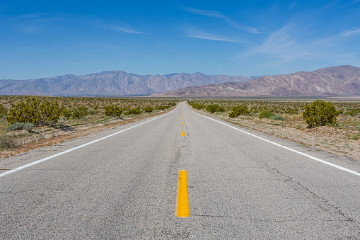 Badlands highway in sunny day, California