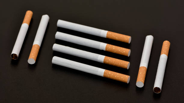 istock photos of cigarette in the black background 2148445227