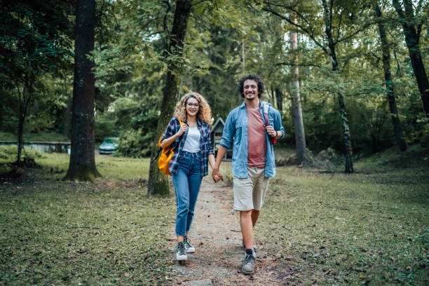 istock Couple walking together in nature 2148445578