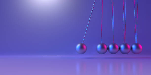 istock 3D rendering Metal Newton's cradle on purple background, side view. 2148445910