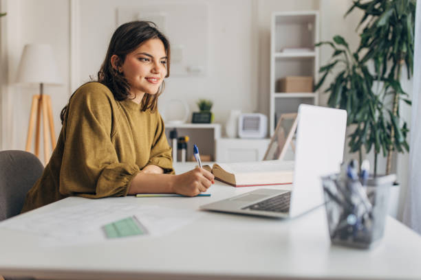istock Young woman working from home 2148445981