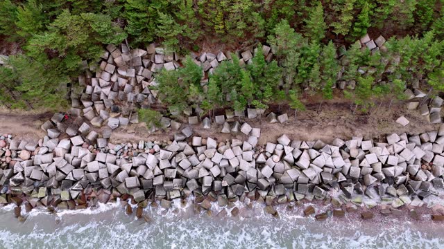 Top View Of Stone Blocks Sea Walls In Uzava, Baltic Sea, Latvia. Aerial Shot