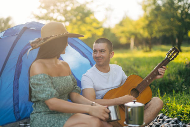 istock Happy smiling couple camping in nature. 2148450678