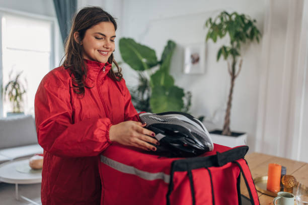 istock Young woman preparing for delivery service at home 2148451600