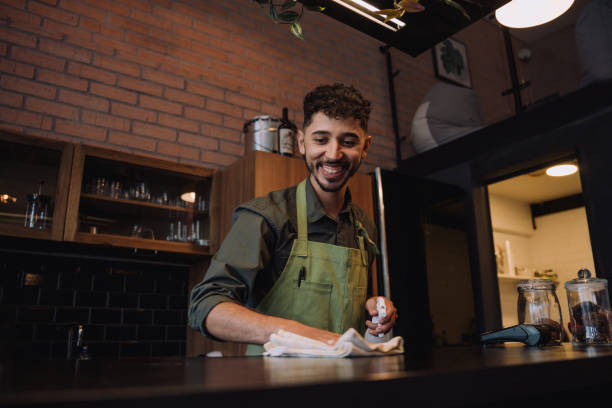 istock Waiter working in coffee shop 2148453788