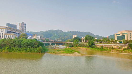 The intersection of Nam Thi River and Hong River. The bridge spans the border between Vietnam and China.