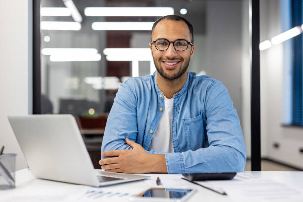 istock Confident Indian businessman working in modern office 2148454797