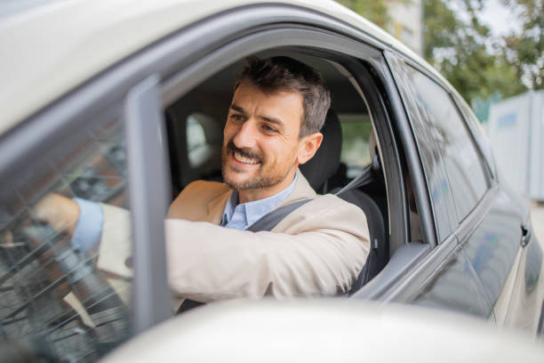 istock Young businessman in a car 2148455476