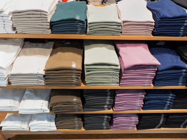 istock Colorful shirts lined up on the sales floor 2148456803
