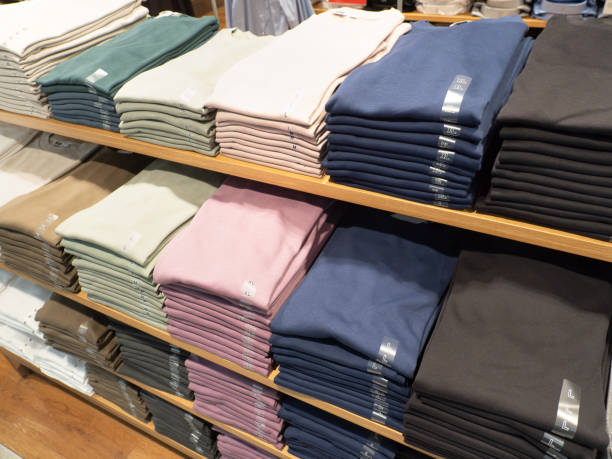 istock Colorful shirts lined up on the sales floor 2148456811