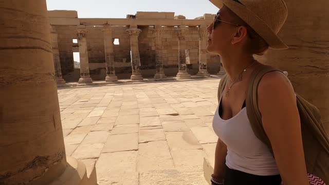 4K Video of Woman walking in Temple of Philae aka Temple of Isis in Aswan Egypt,Agilkia Island