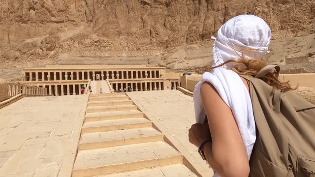 4K Video of Woman walking to a Temple of Queen Hatshepsut, Luxor Egypt