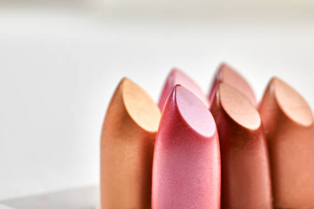 istock Macro of six lipstick bullets on light grey background 2148460746